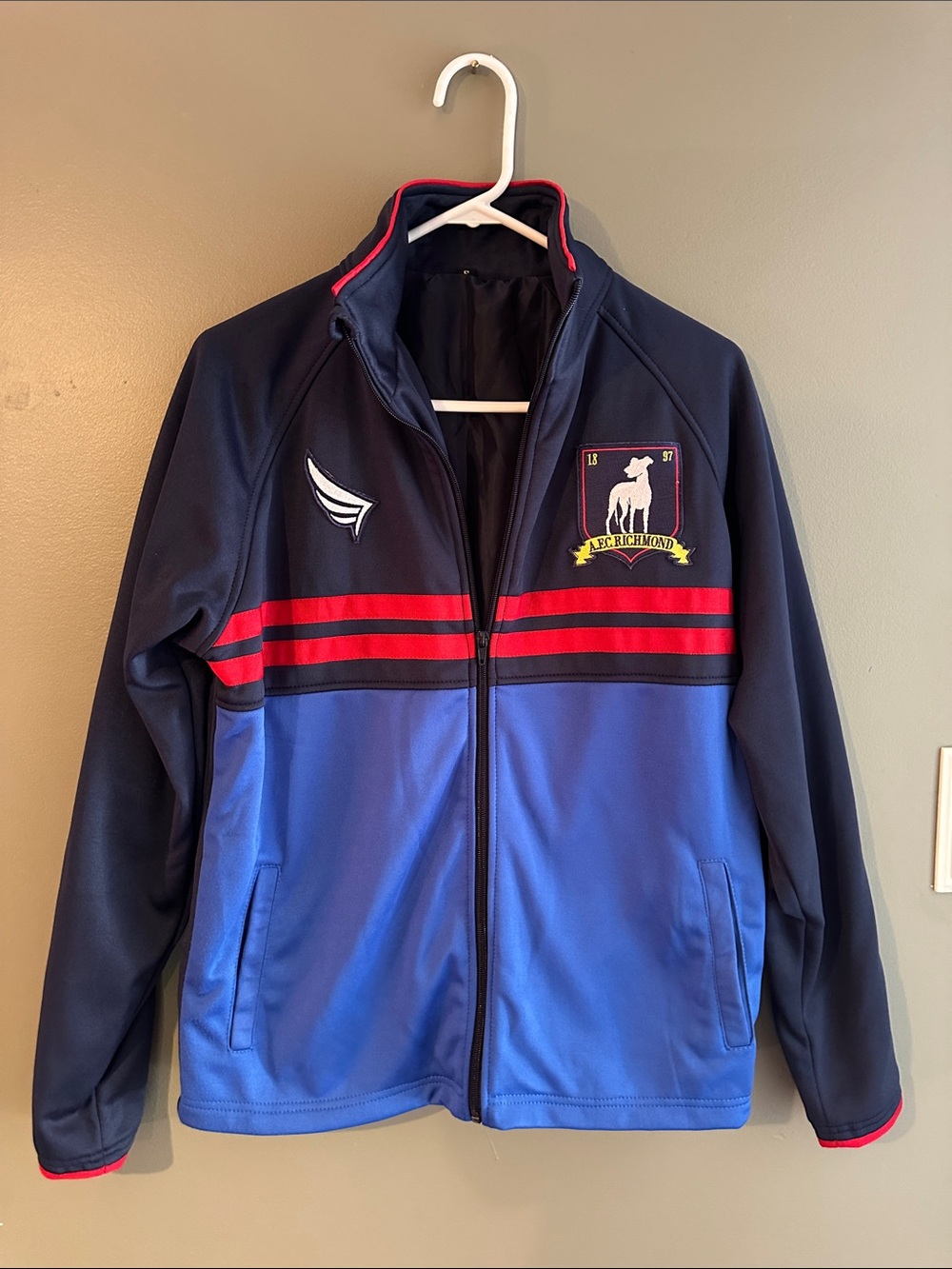 Ted Lasso AFC Richmond Navy and Royal Blue Zip-Front Jacket with Red Stripes